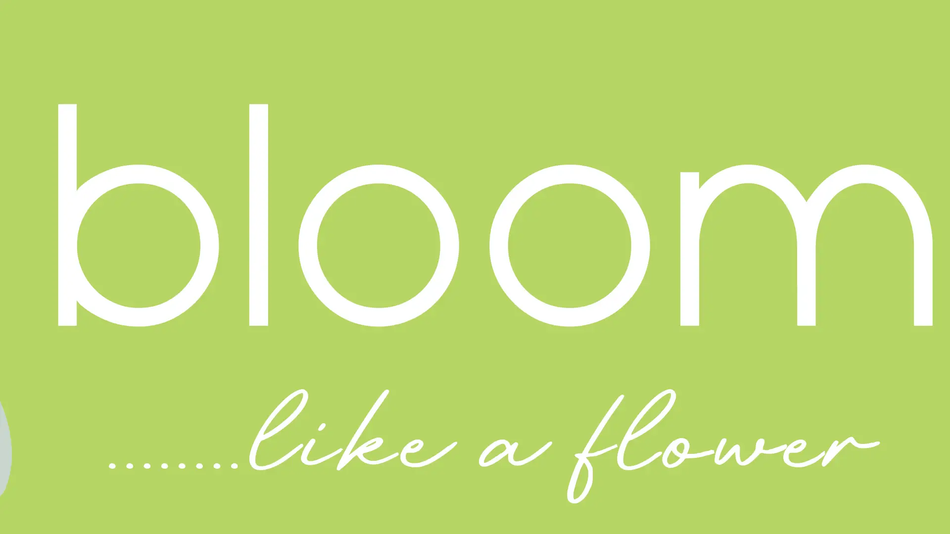 A green background with white lettering of BLOOM