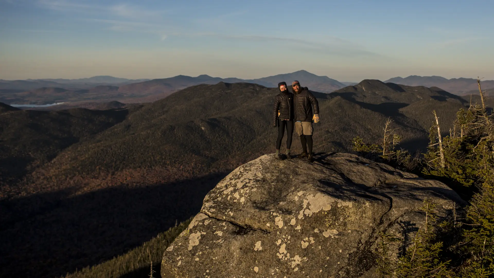 Two people on the summit of Seymour