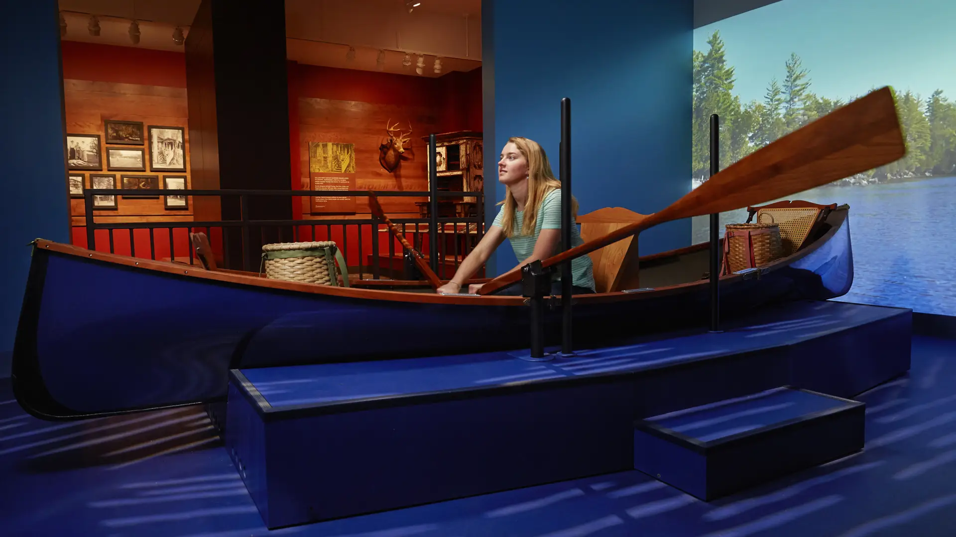 A woman rows a display boat