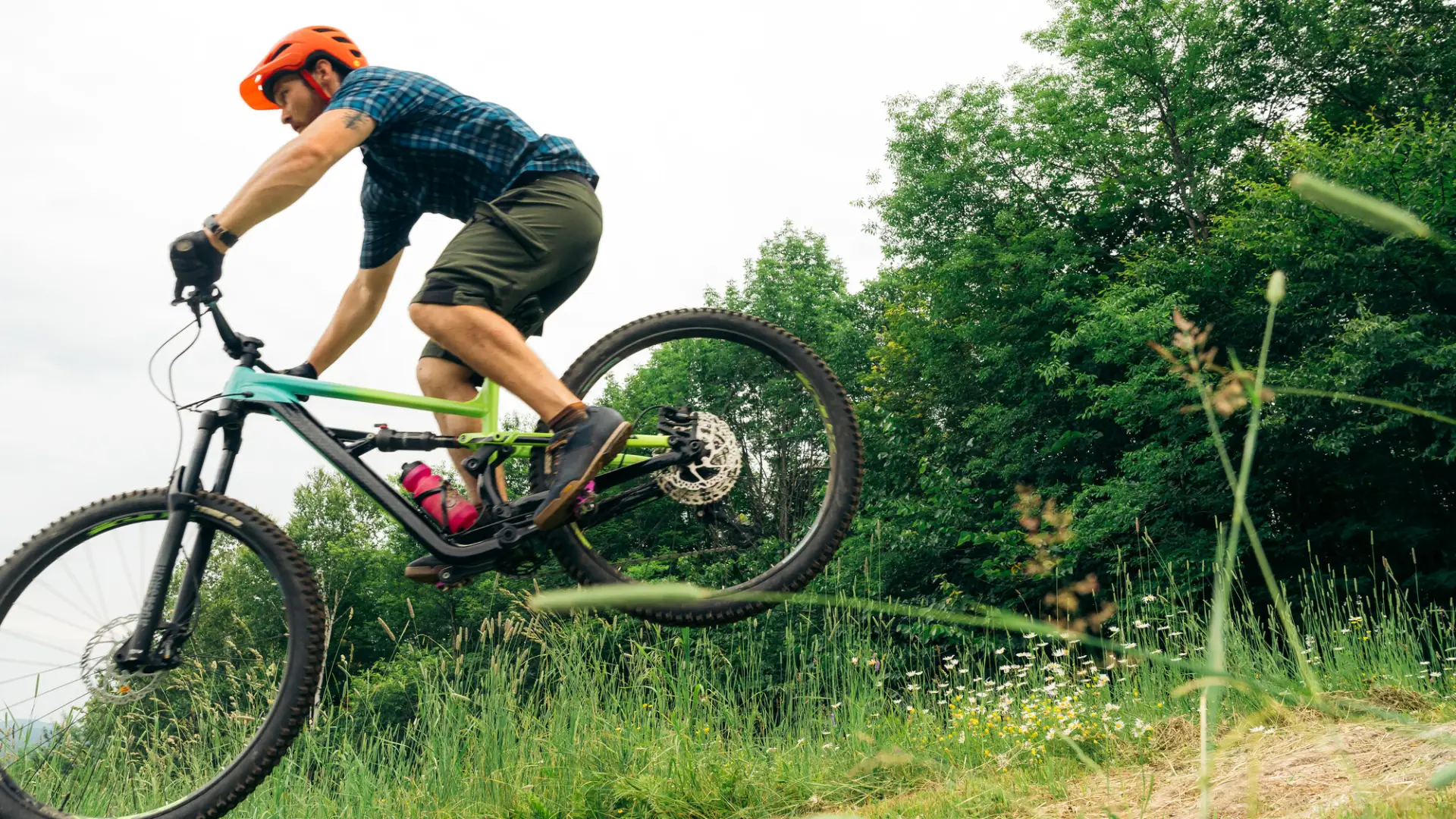 A mountain biker gets air