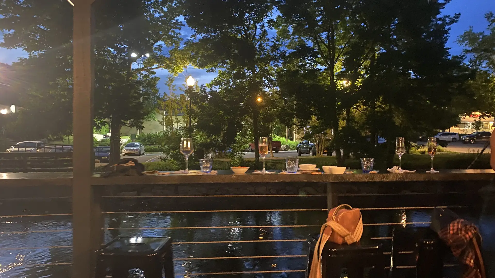 Looking out over the river at the street lights at dusk