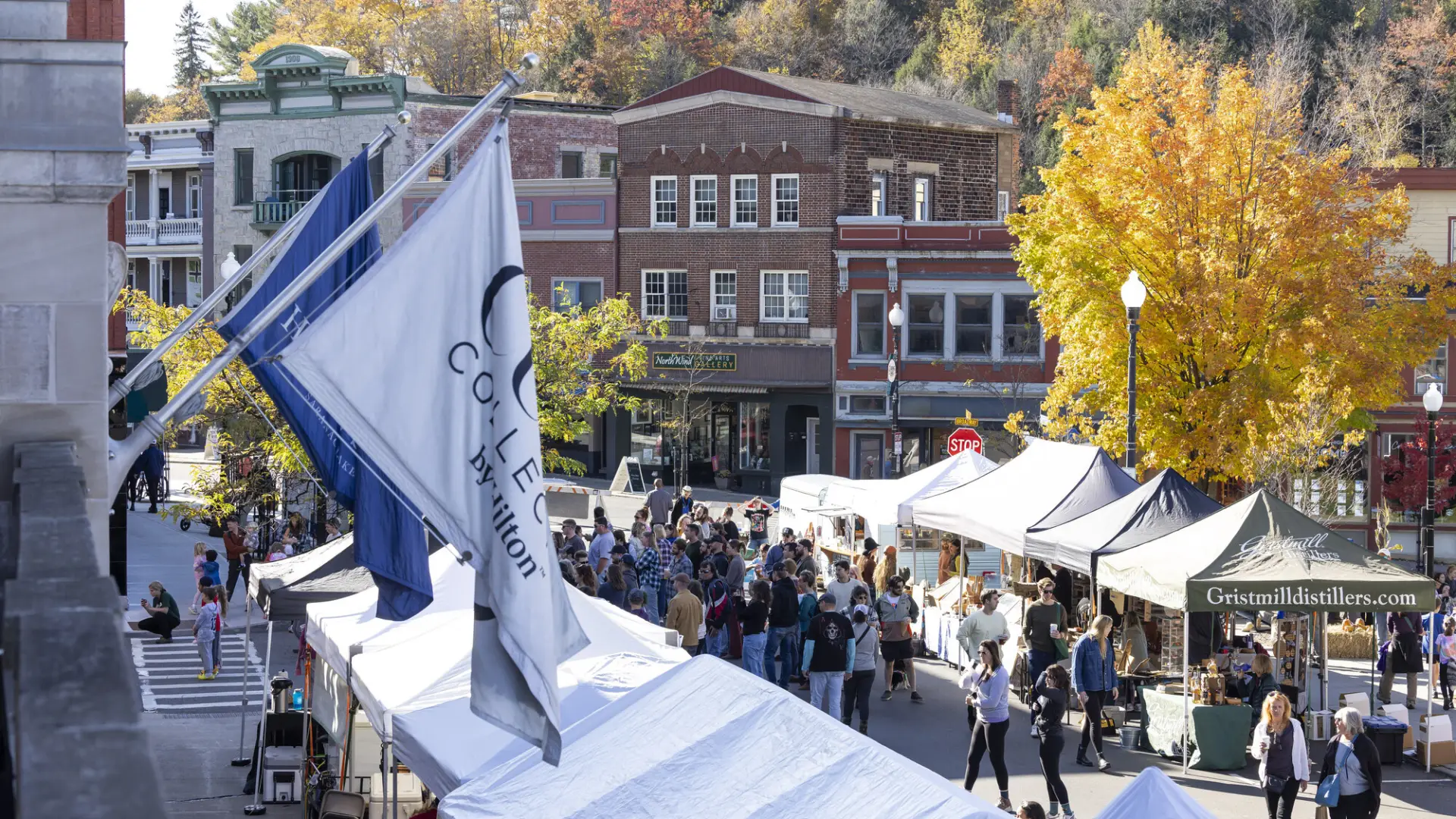 A farmers market in the middle of a town. 