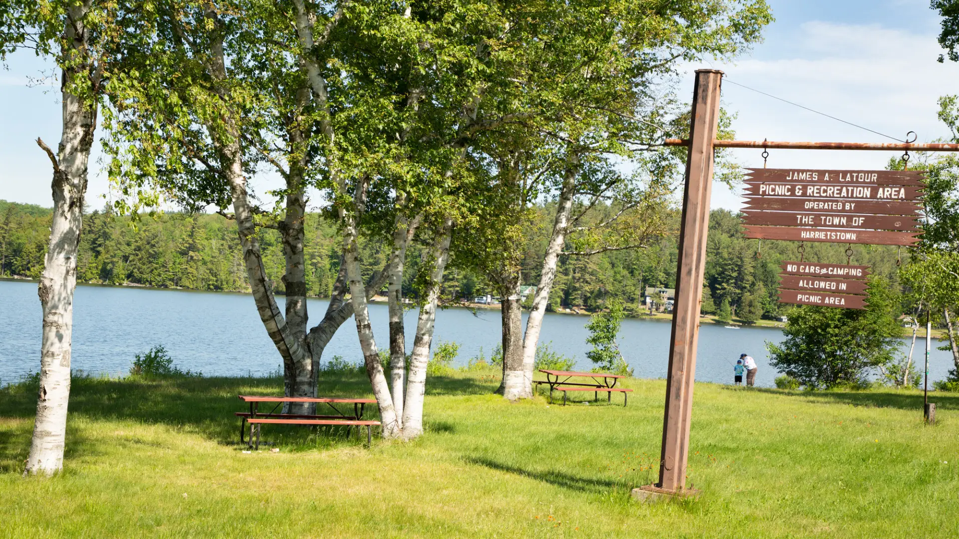 The wooden sign for Latour Park