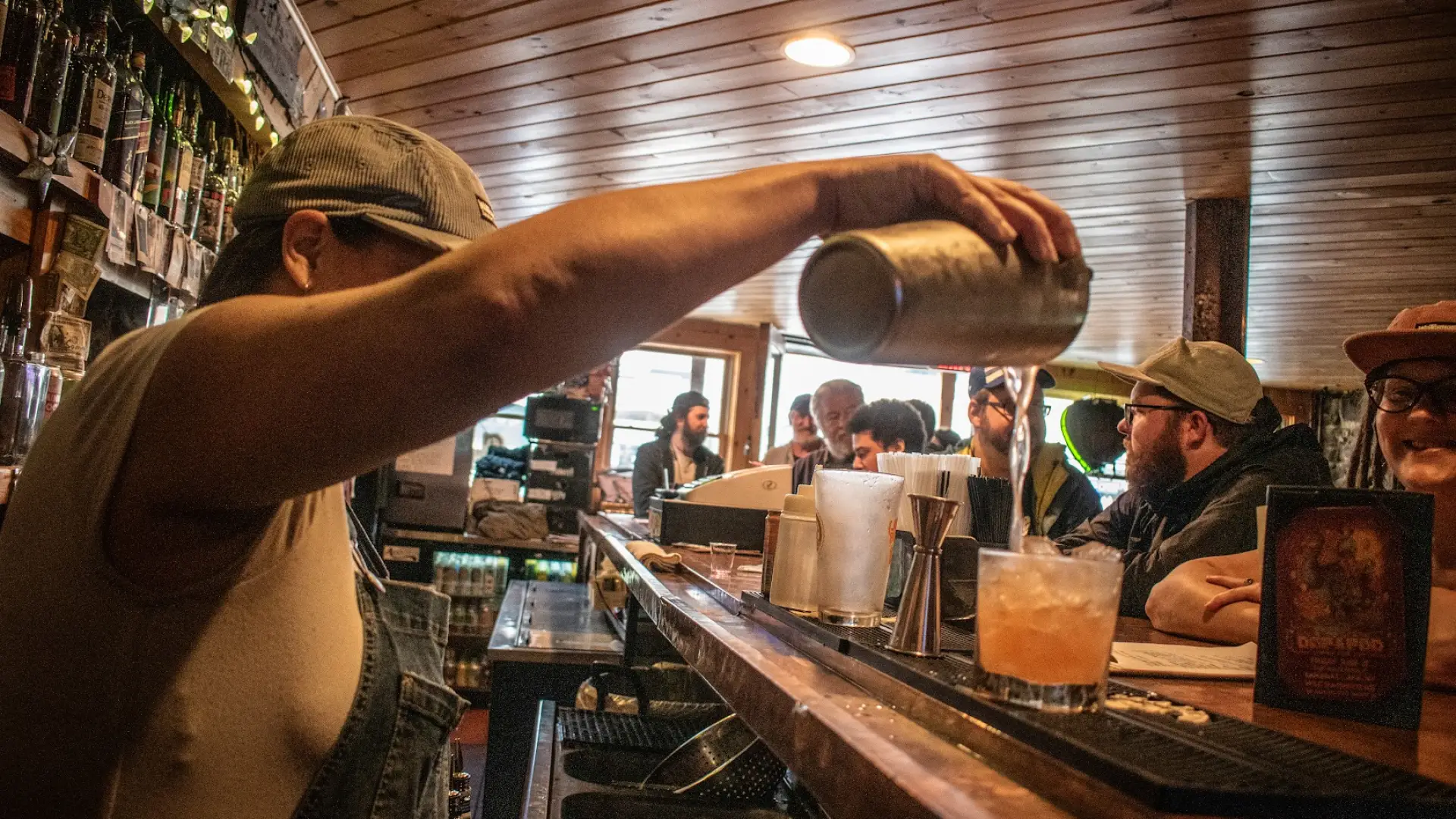 Person pouring a drink
