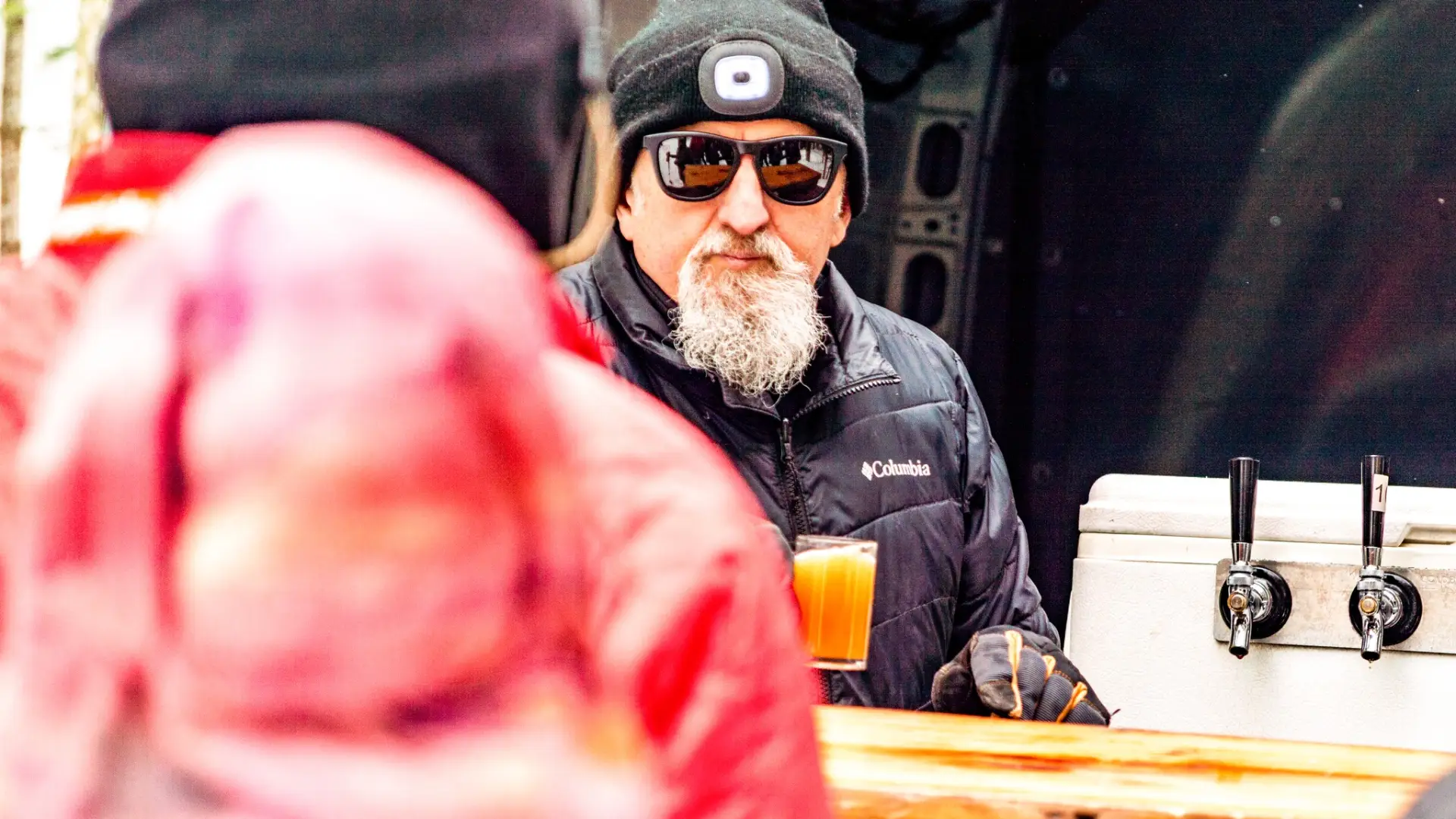 beer drinker sitting at table  