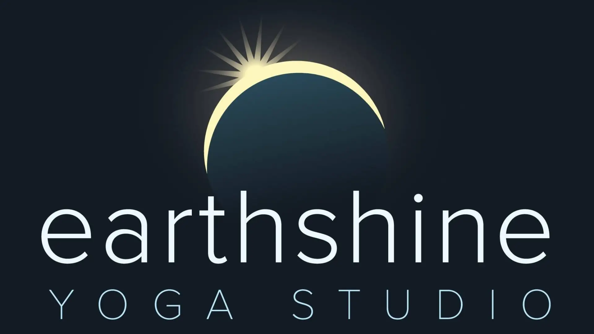 "Earthshine Yoga Studio with eclipsing sun image