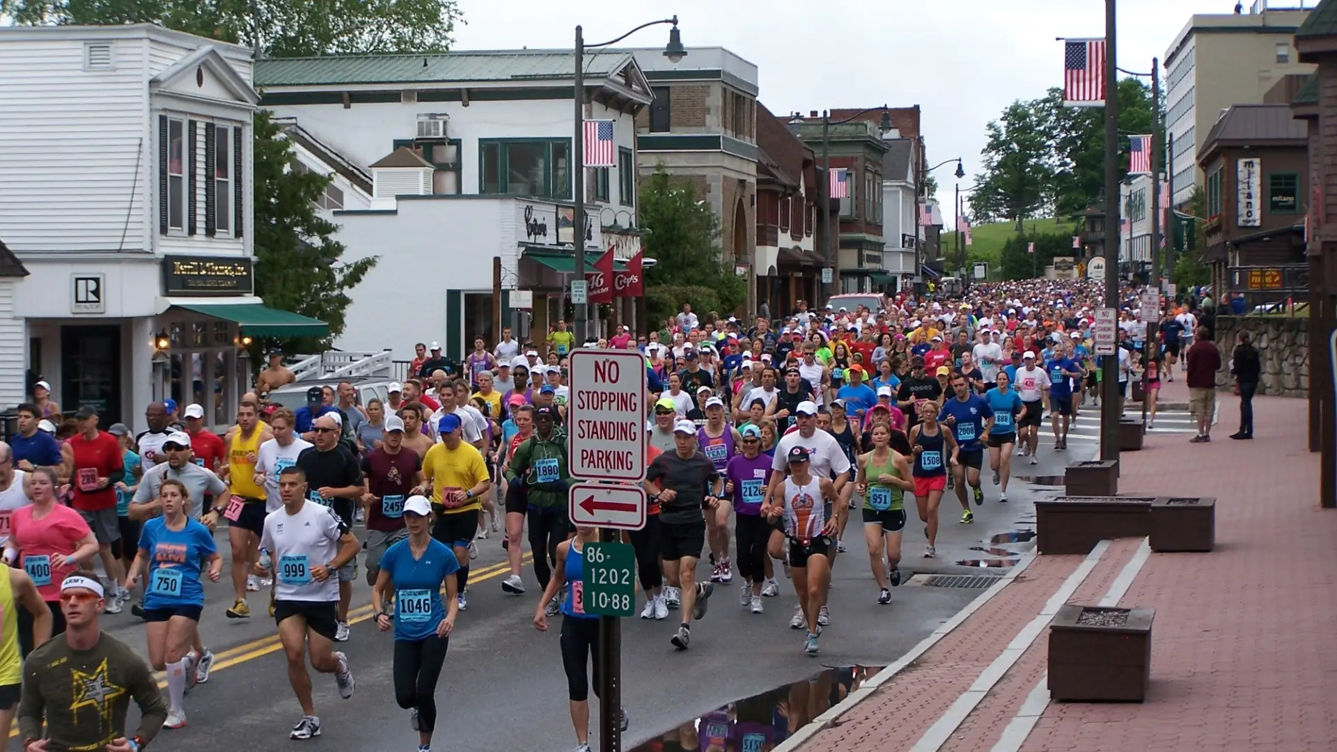 Lake Placid Main Street is packed with runners