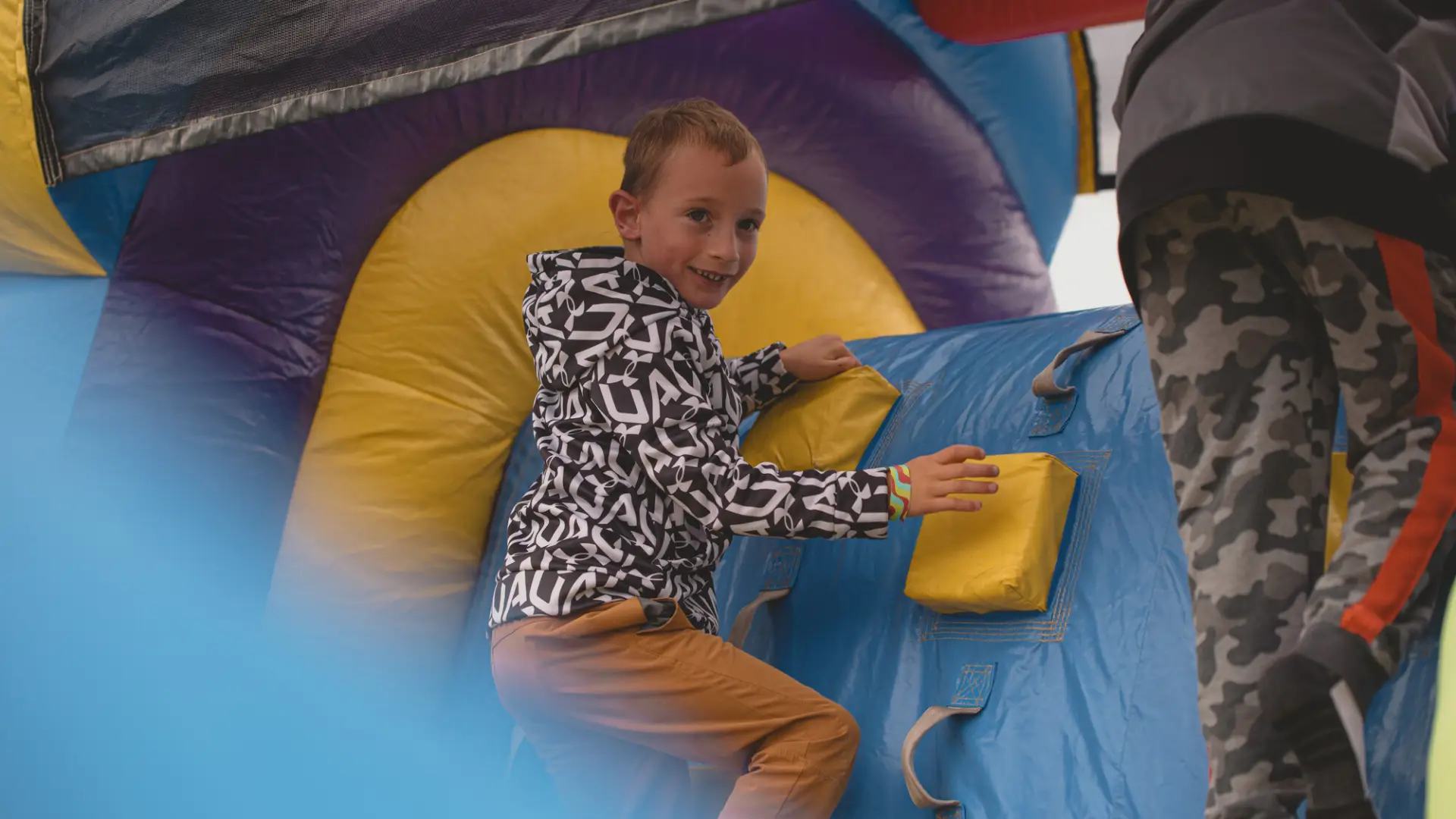 Child in a bounce house at Tupper Lake's fall festival