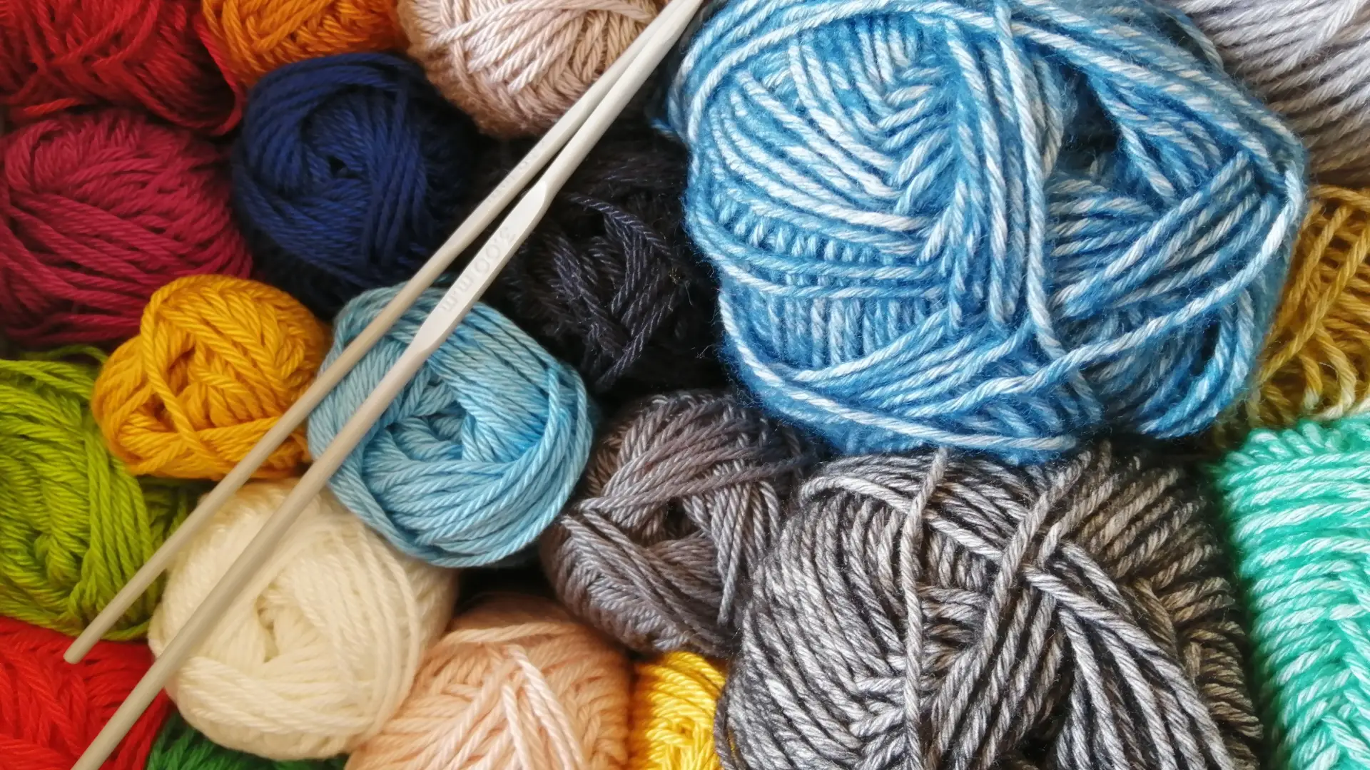 Various balls of colorful yarn