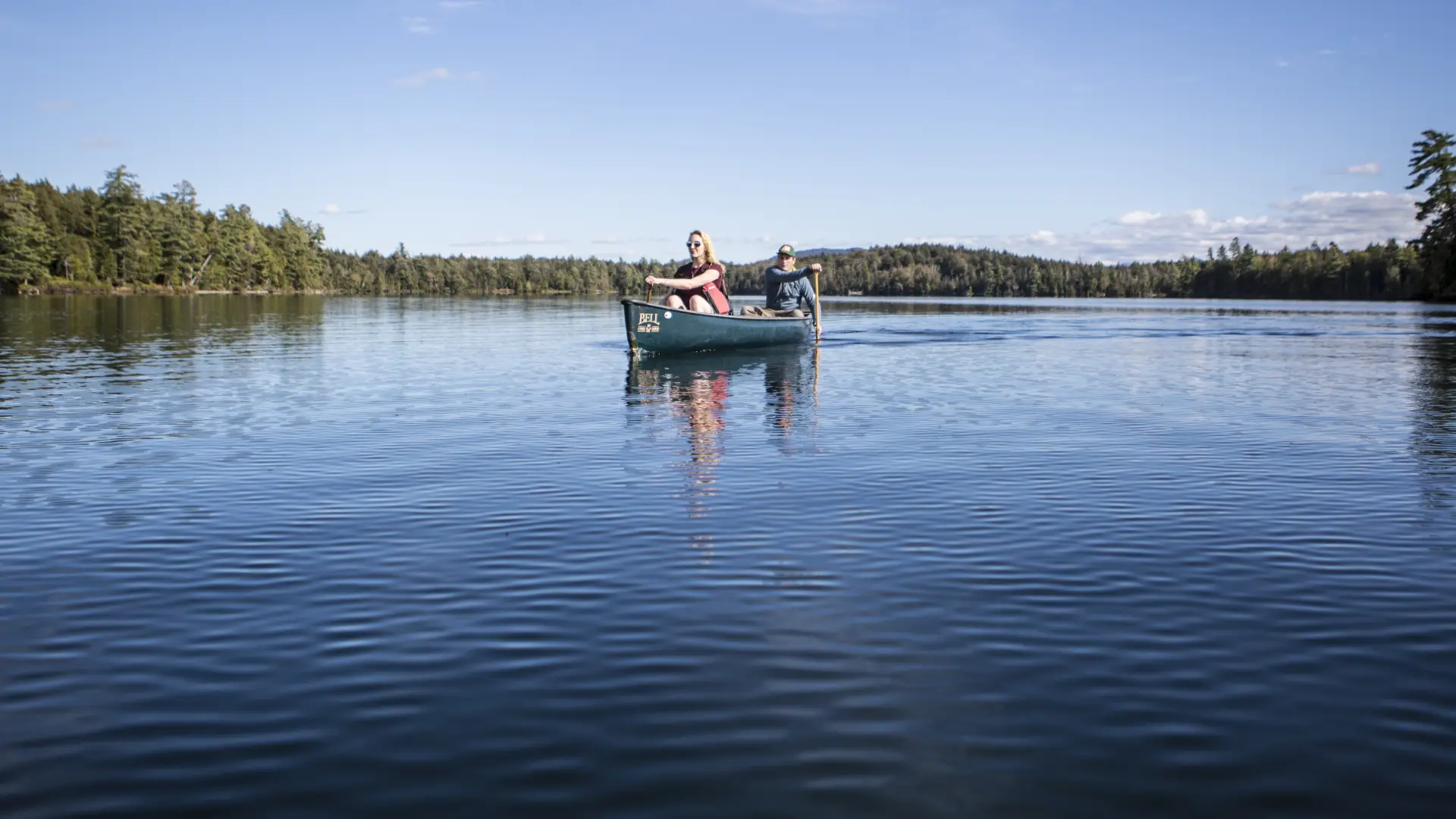 A couple people in a canoe