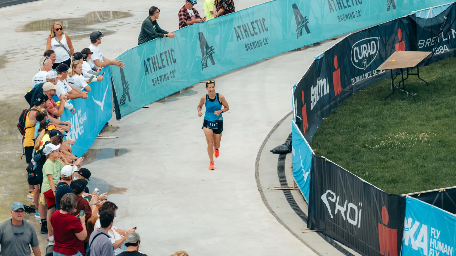 Ironman athlete approaching finish on oval