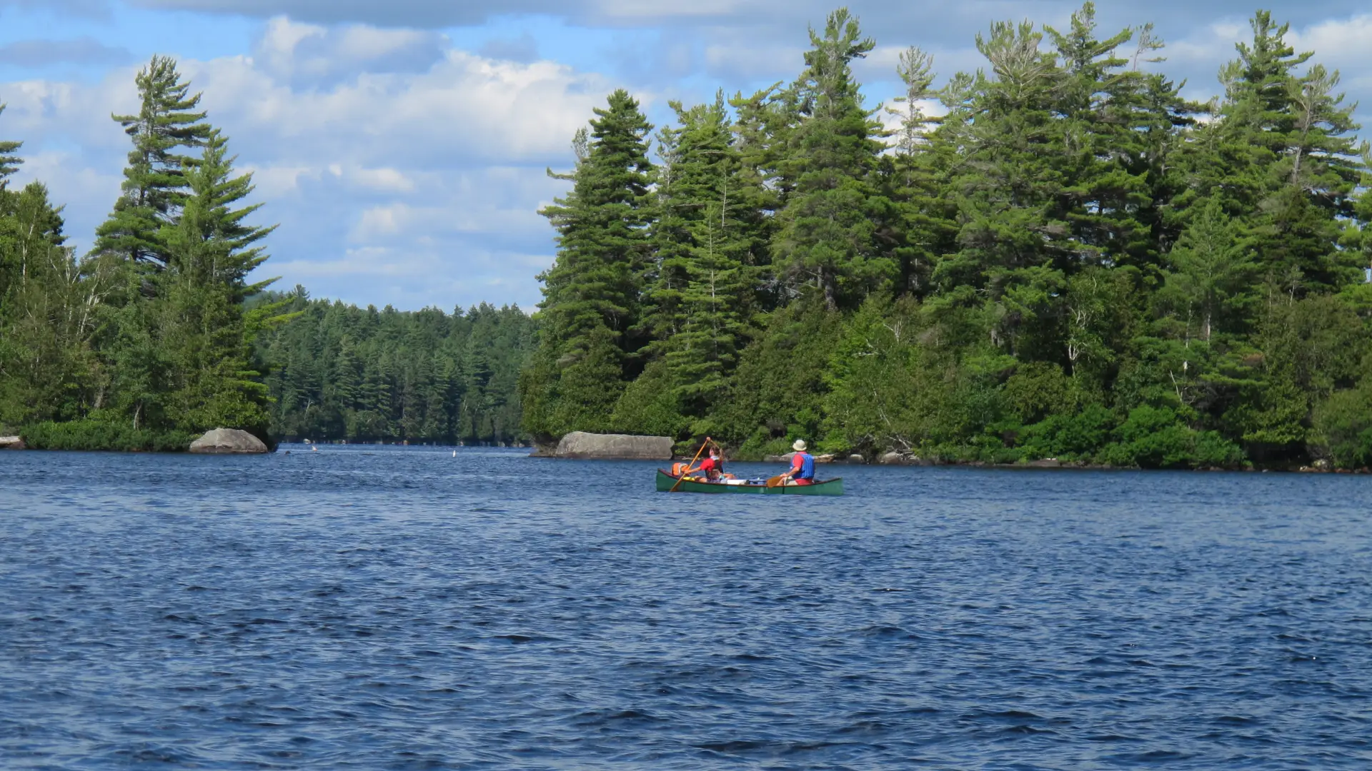 People paddling to their campsite on Lower Saranac Lake