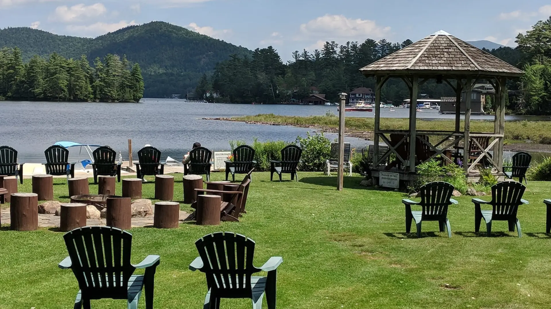 Chairs on the lawn by the lake.