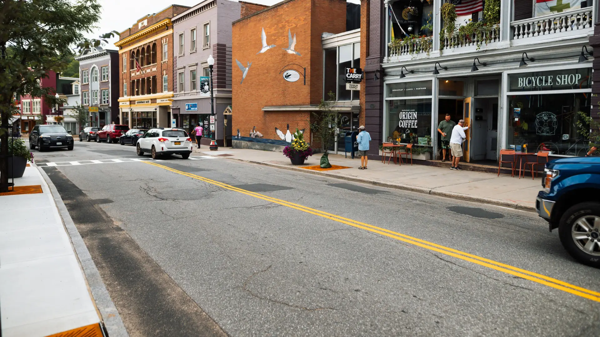 The exterior of Origin Coffee from the opposite side of Broadway in Saranac Lake.