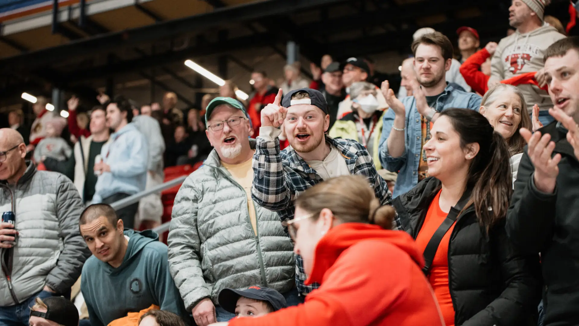 Fans in lower bowl of 1980 Herb Brooks Arena cheer at an ECAC Men's Hockey Championship game