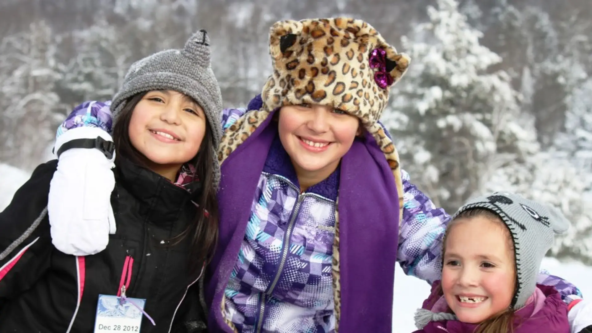 A group of three kids at Titus Mountain Ski Area.