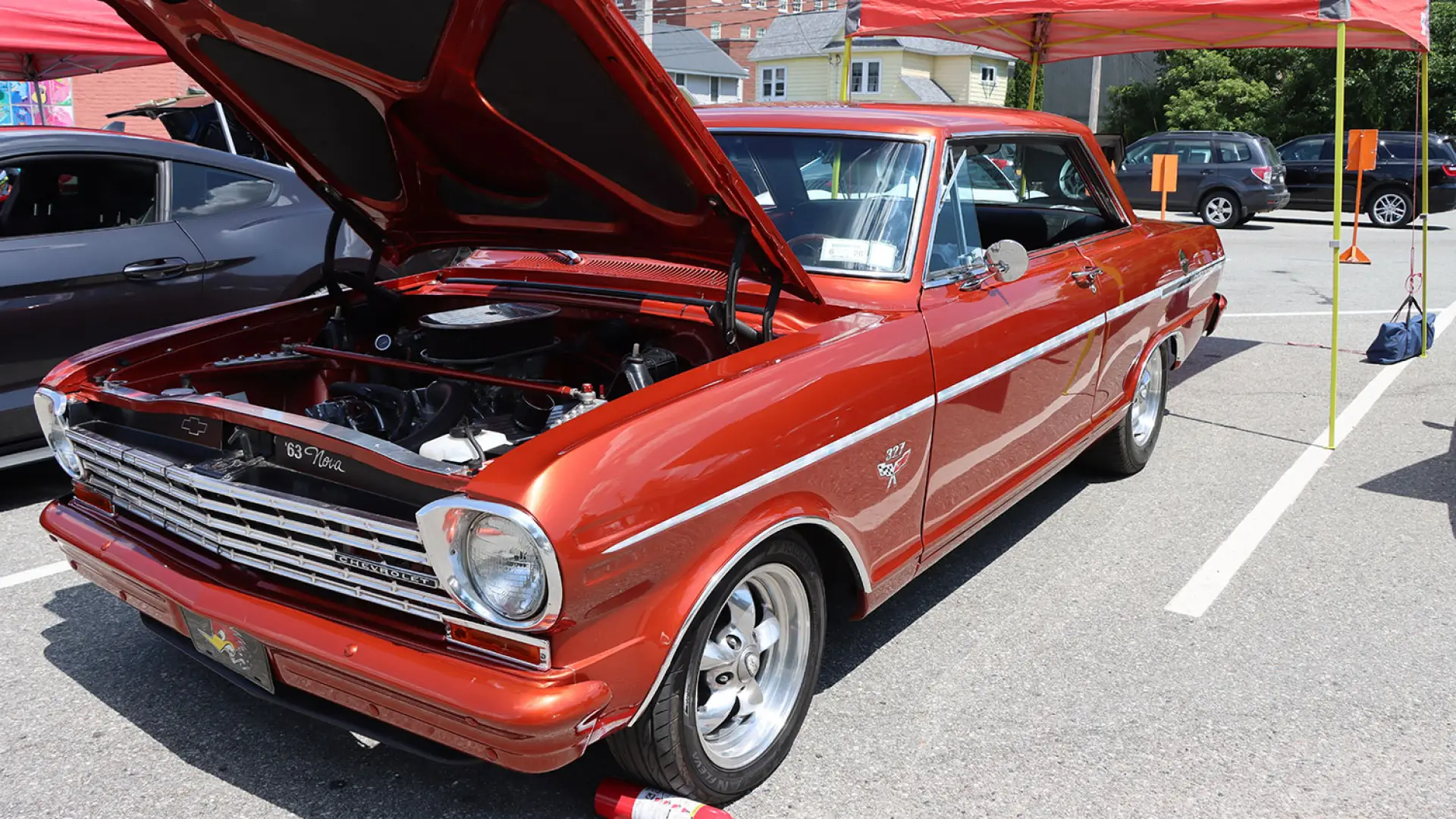 red car hood popped 
