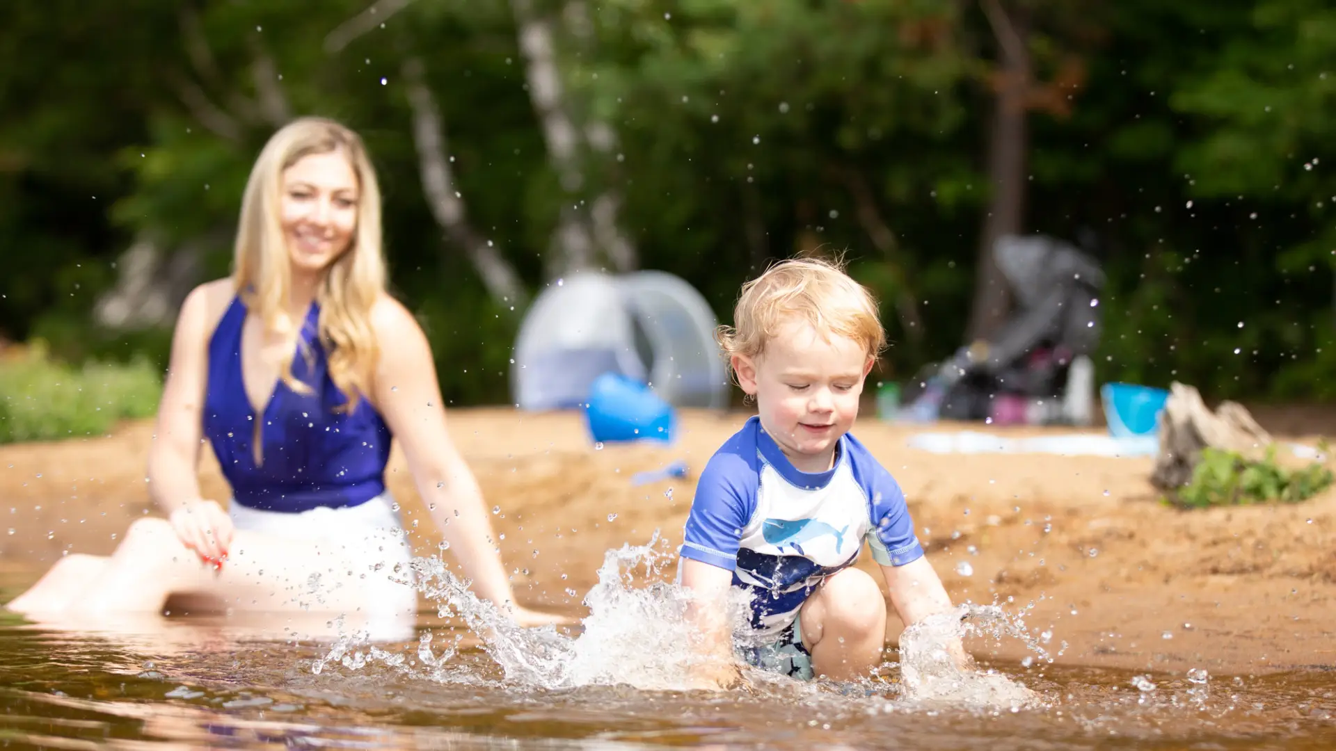 A family swimming in Lake Clear.