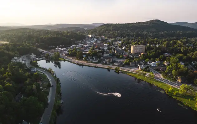 An aerial view of a lake and small town. 