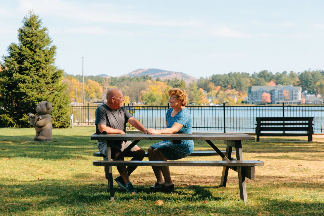 A fall couple in a park.
