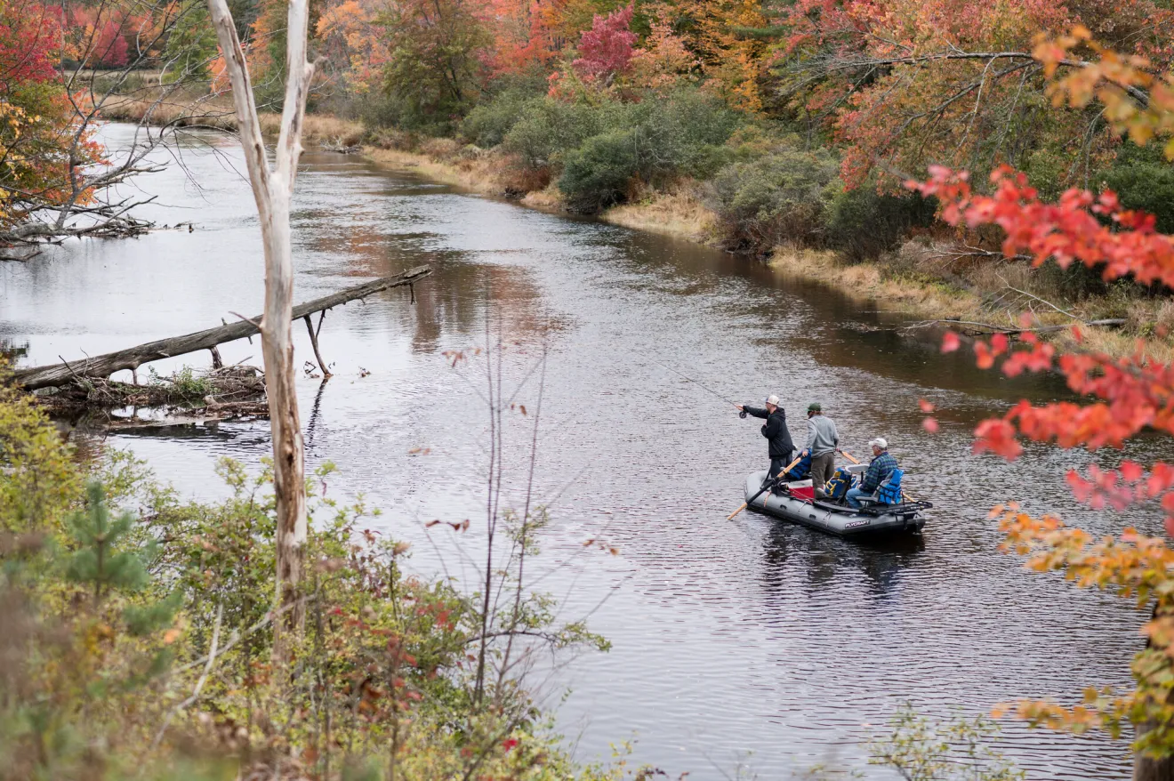 Fall boating in Saranac Lake.