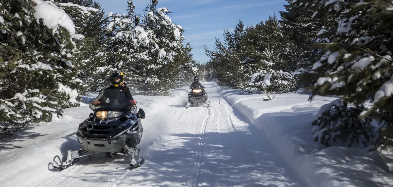 Snowmobiling in Lake Clear.
