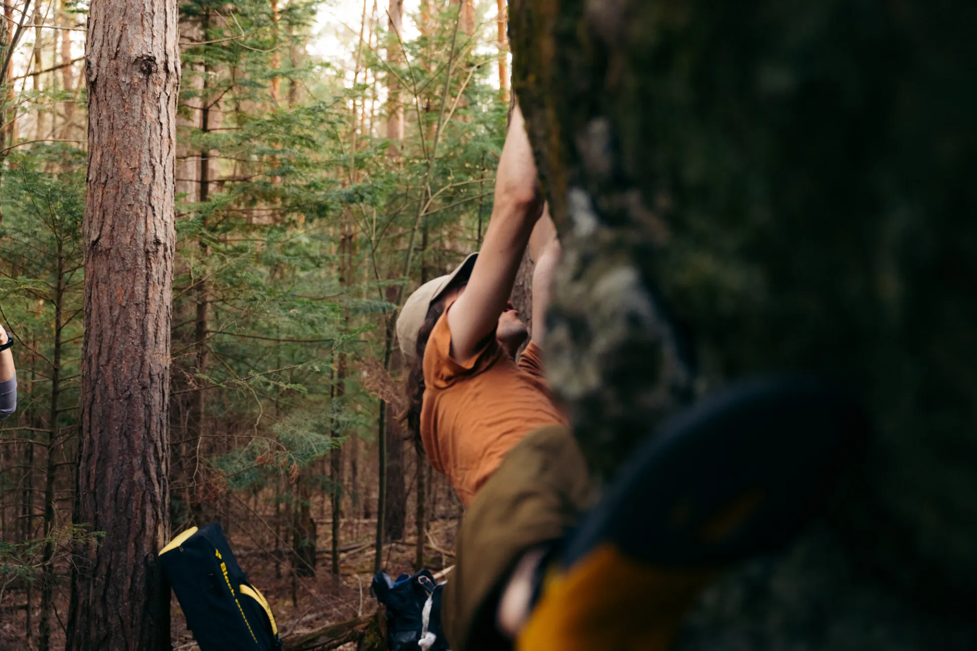 Bouldering in the spring in Saranac Lake.