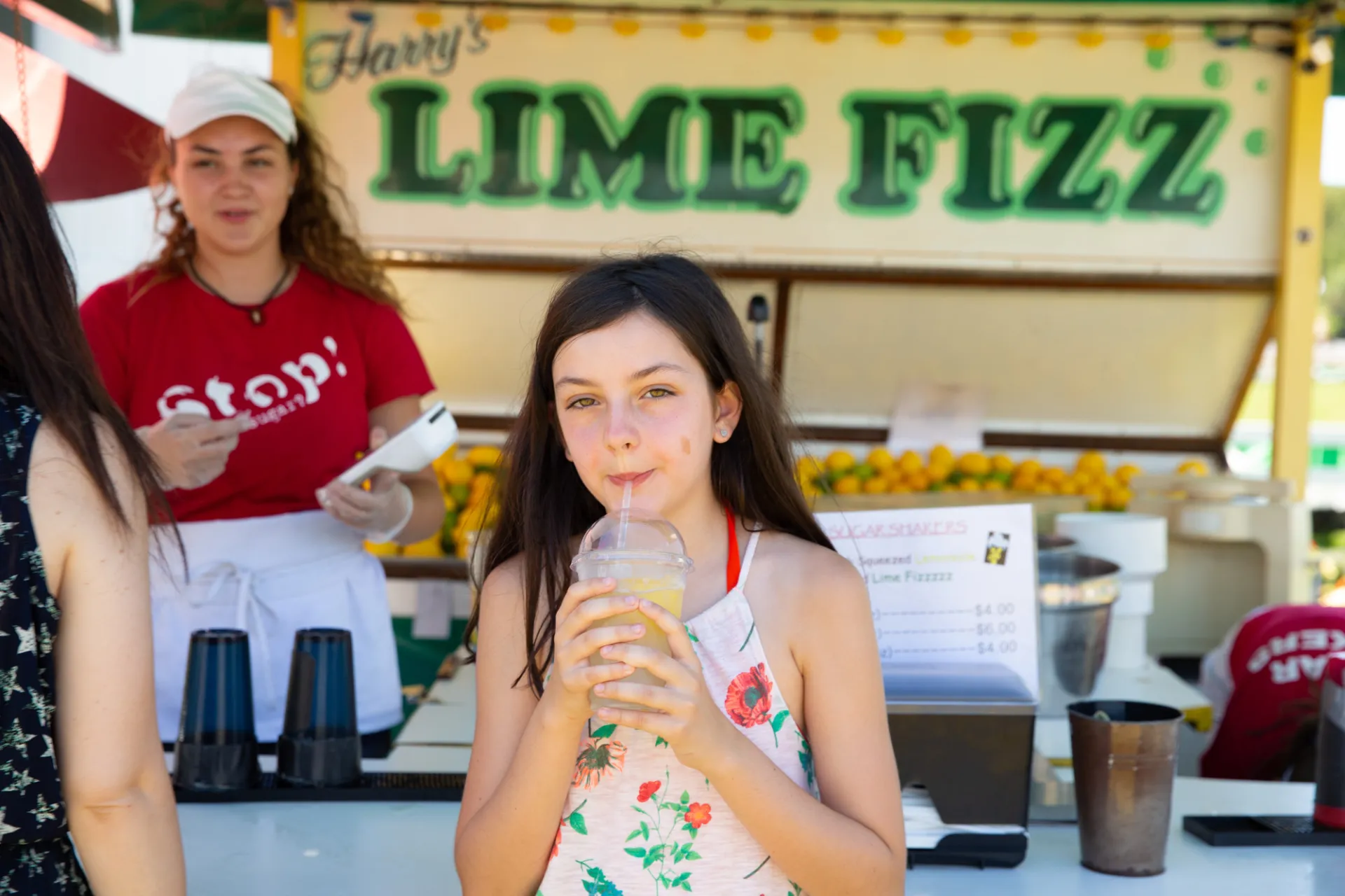 Child enjoys lemonade at the Lake Placid Horse Show