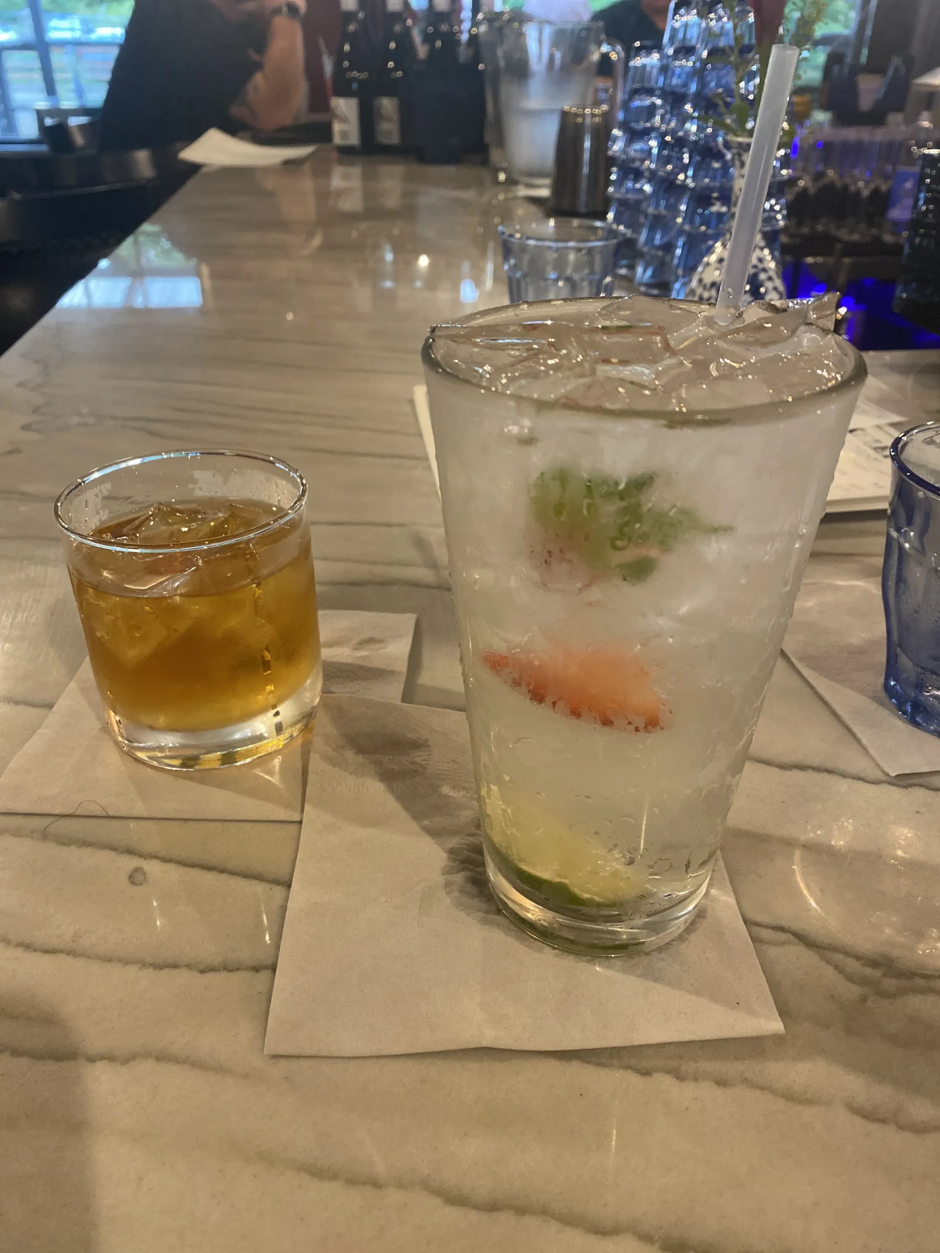 Craft cocktails sitting on the bar top