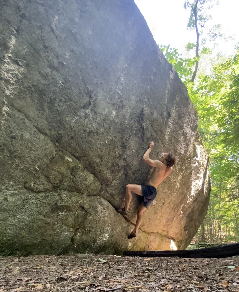 A bouderer on a rock face
