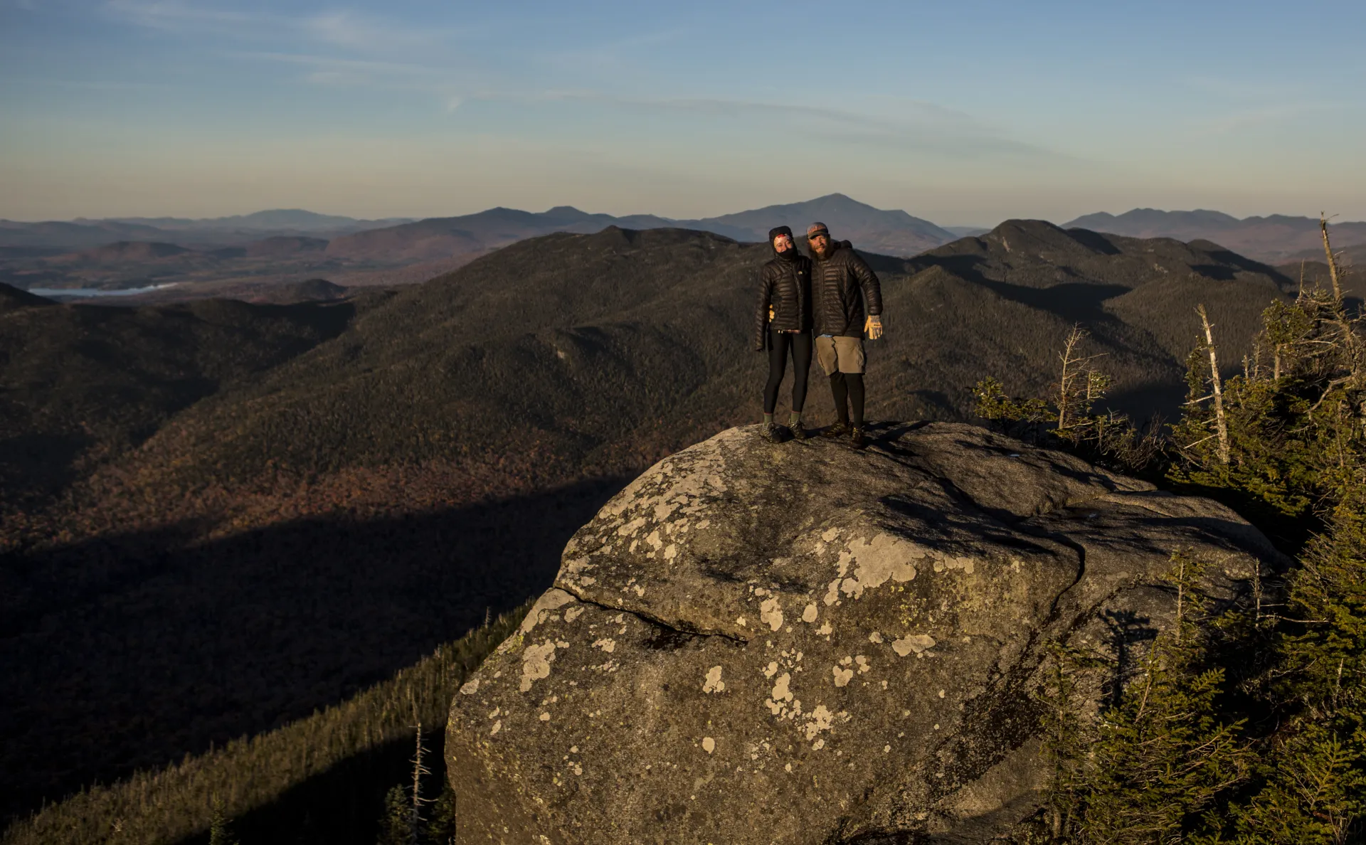 Two people on the summit of Seymour