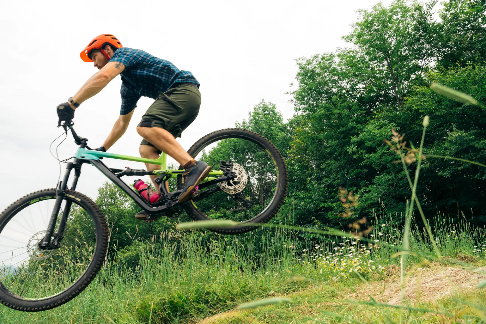 A mountain biker gets air