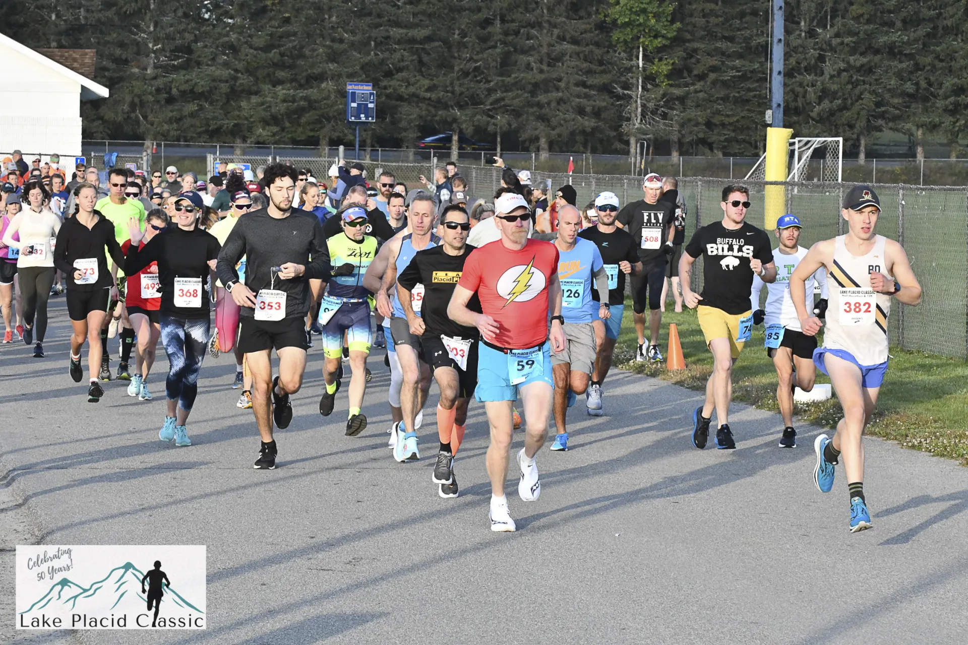 Participants run at the horse show grounds in the Lake Placid Classic half marathon