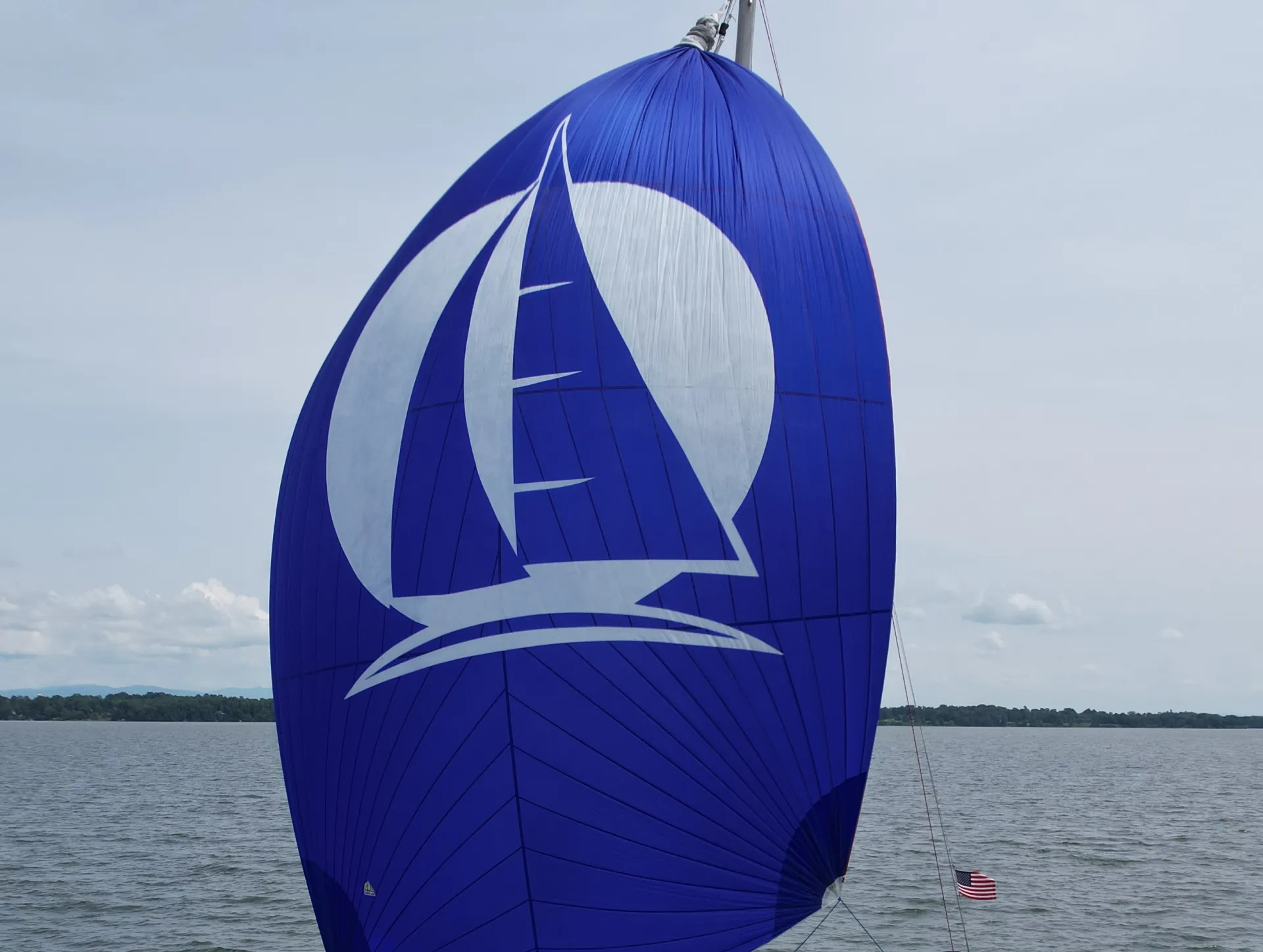 Blue sail on sailboat