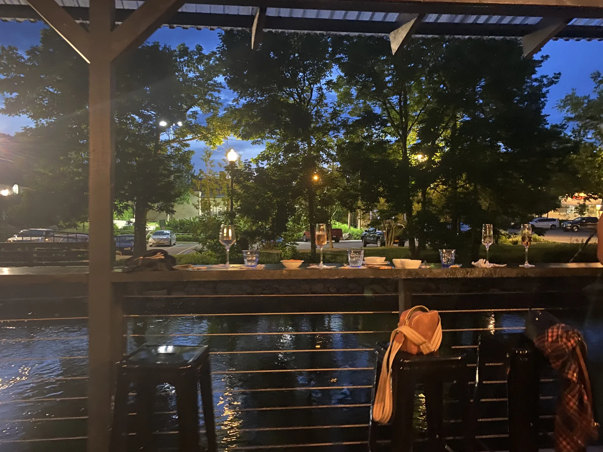 Looking out over the river at the street lights at dusk