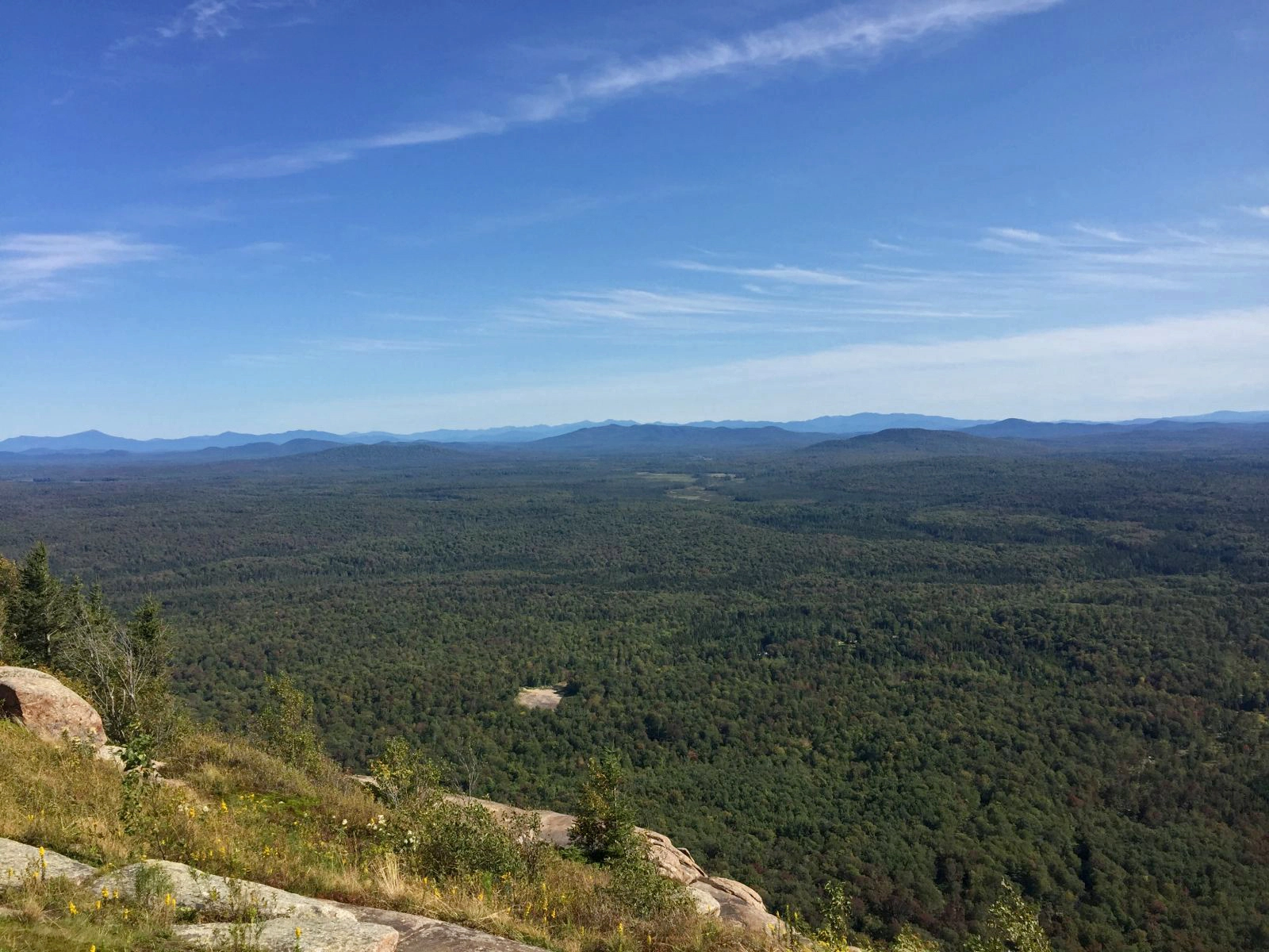 The view of a plain and distant mountains from Azure.