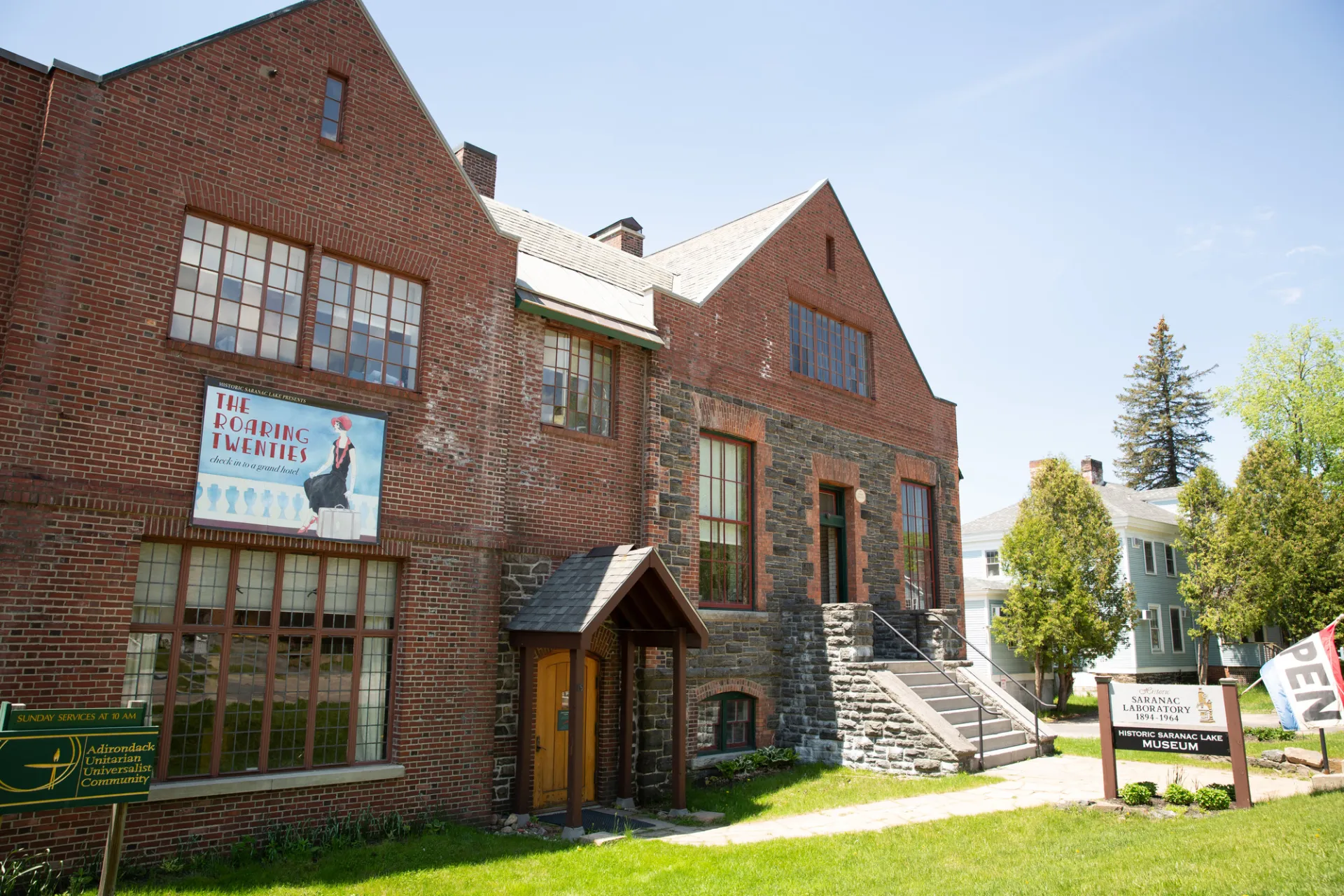 a brick historic museum on a sunny day.