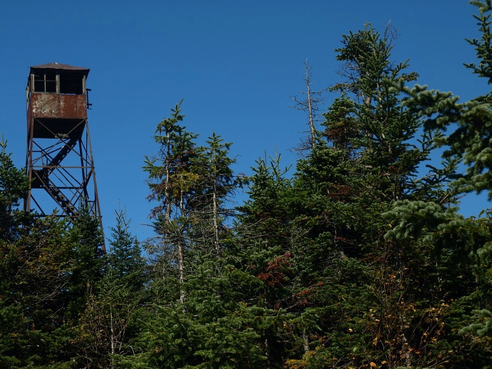 The old, rusty firetower on Loon Lake Mountain