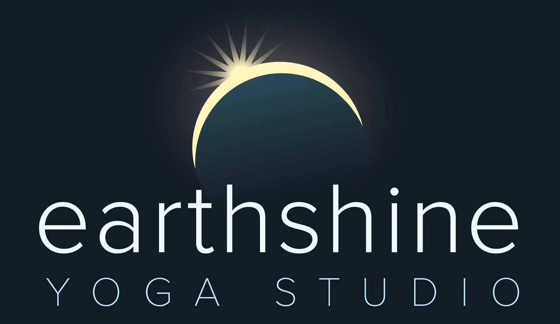 "Earthshine Yoga Studio with eclipsing sun image