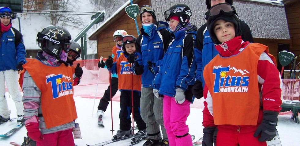A group of kids ready to ski at Titus Mountain.