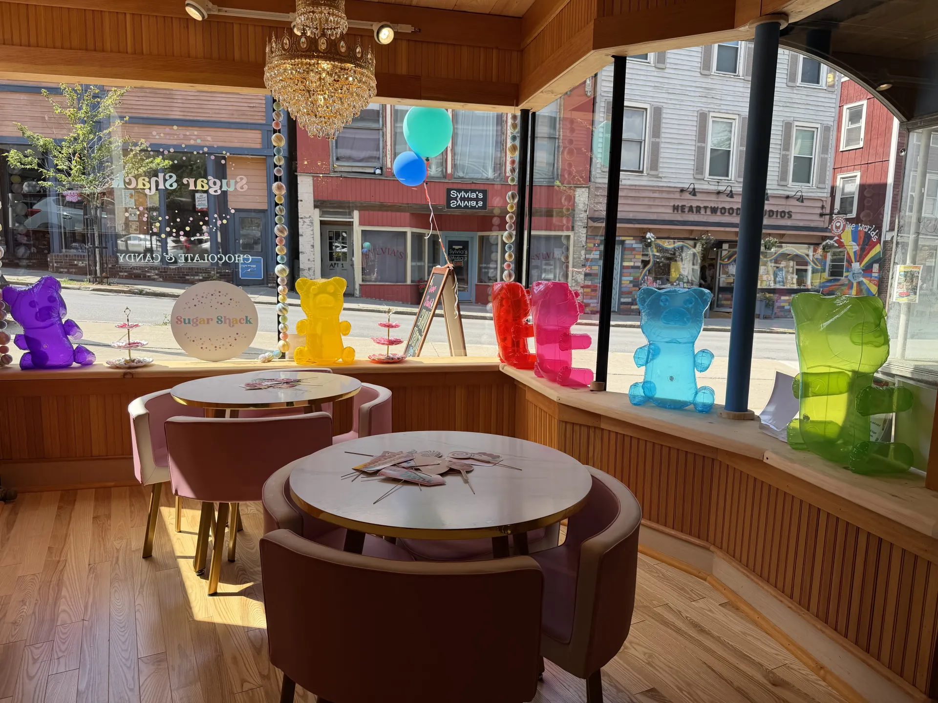 The front display window at Sugar Shack with giant, colorful gummy bears.