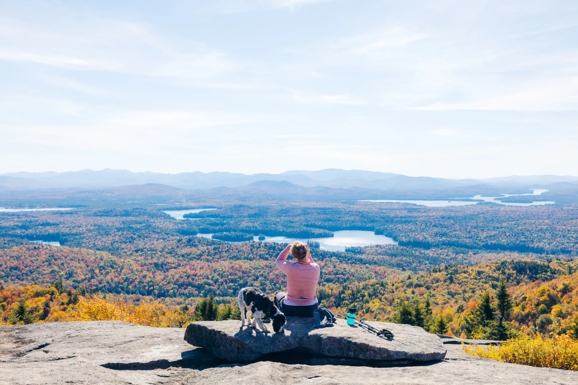 A woman on a fall summit.