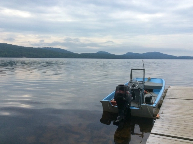 A boat at a dock