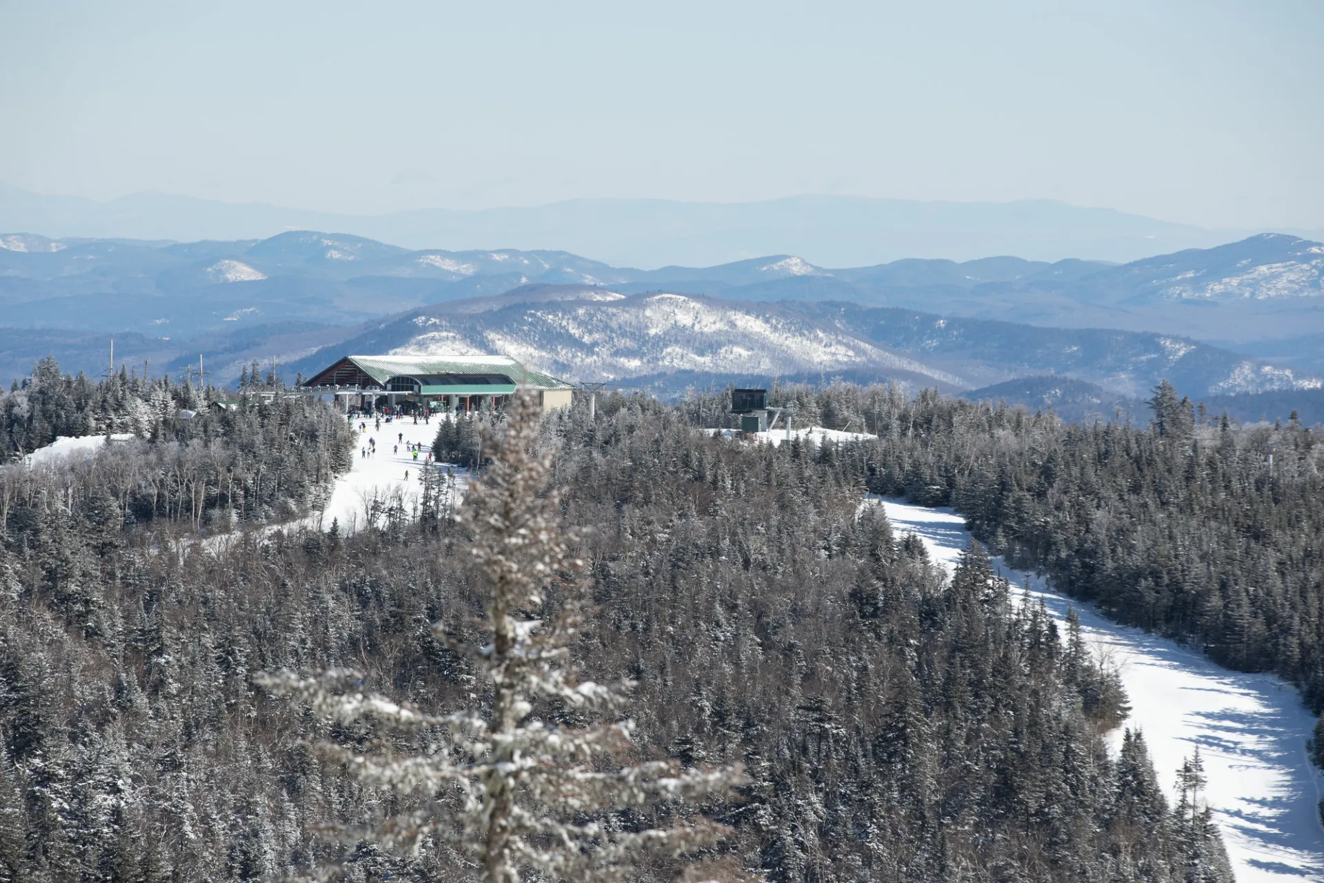 A ski area's lodge on a summit