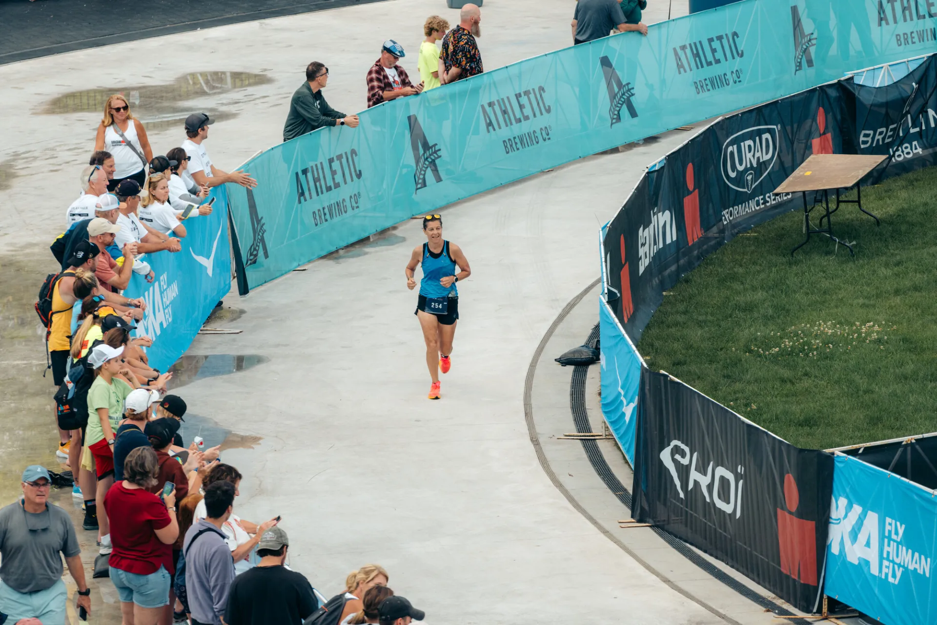 Ironman athlete approaching finish on oval