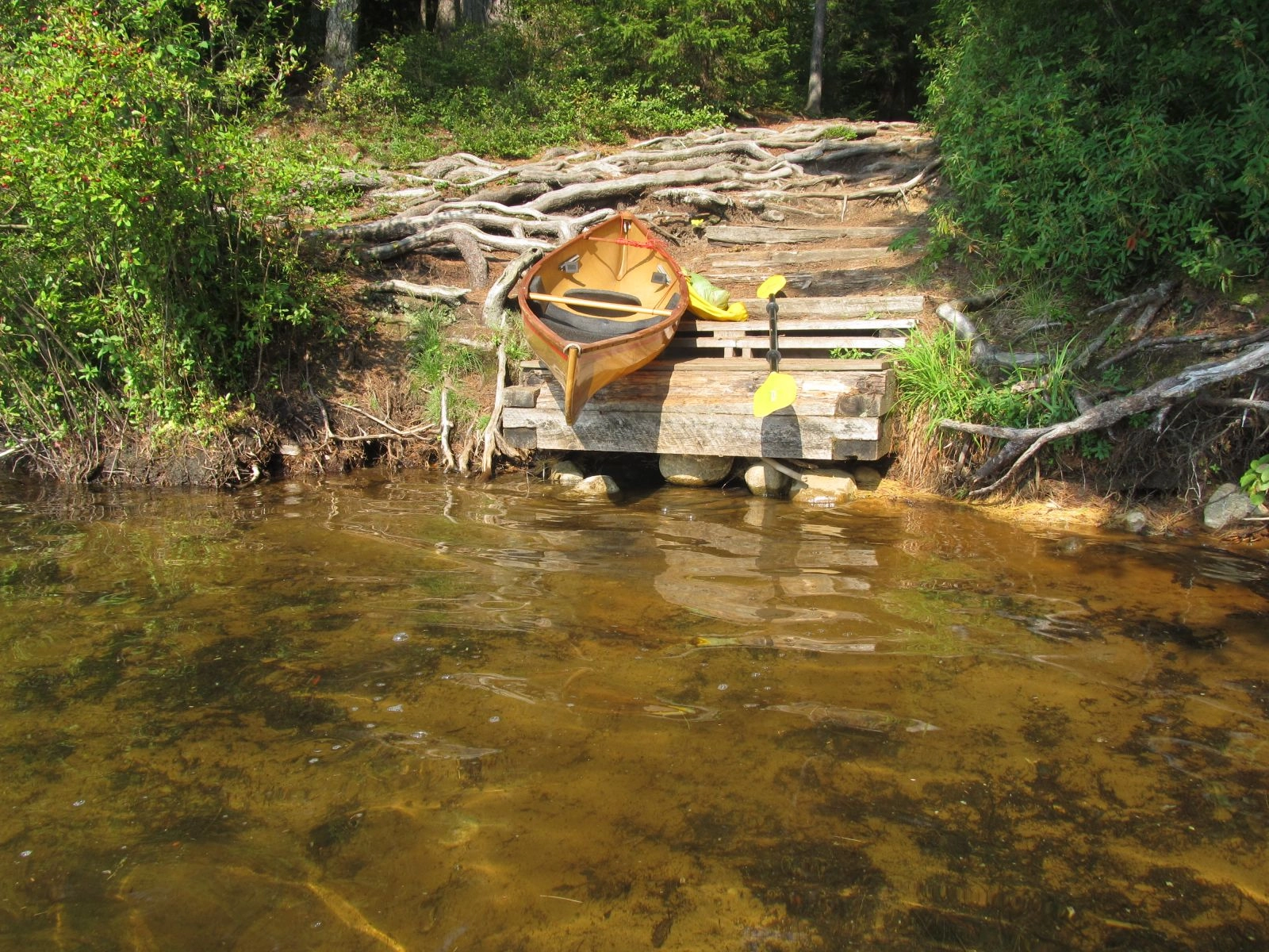 Canoe rest on the put in at Polliwog