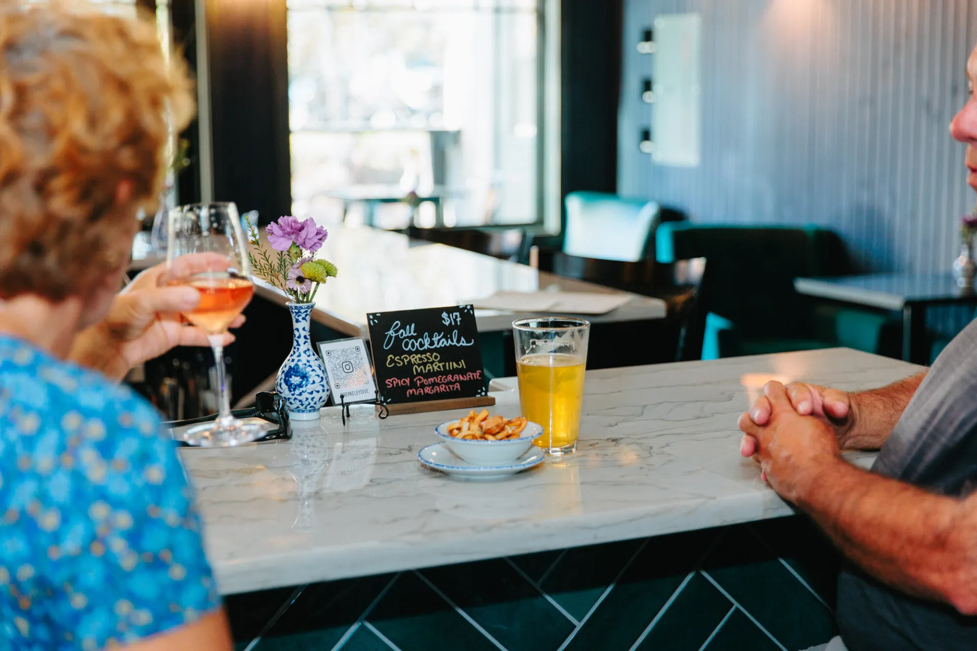 Berkeley dive - couple having a drink at the bar