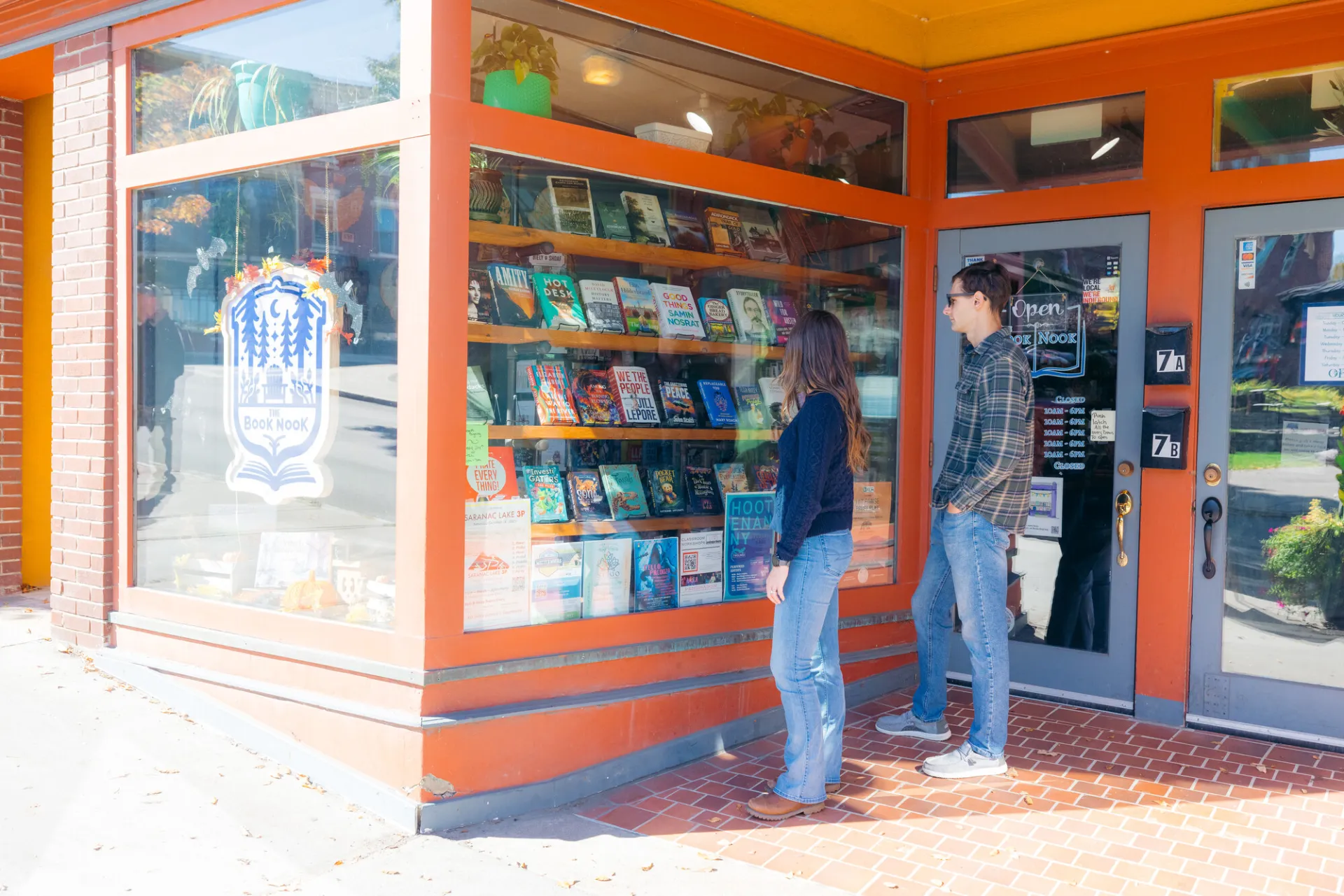 A couple shopping in downtown Saranac Lake.