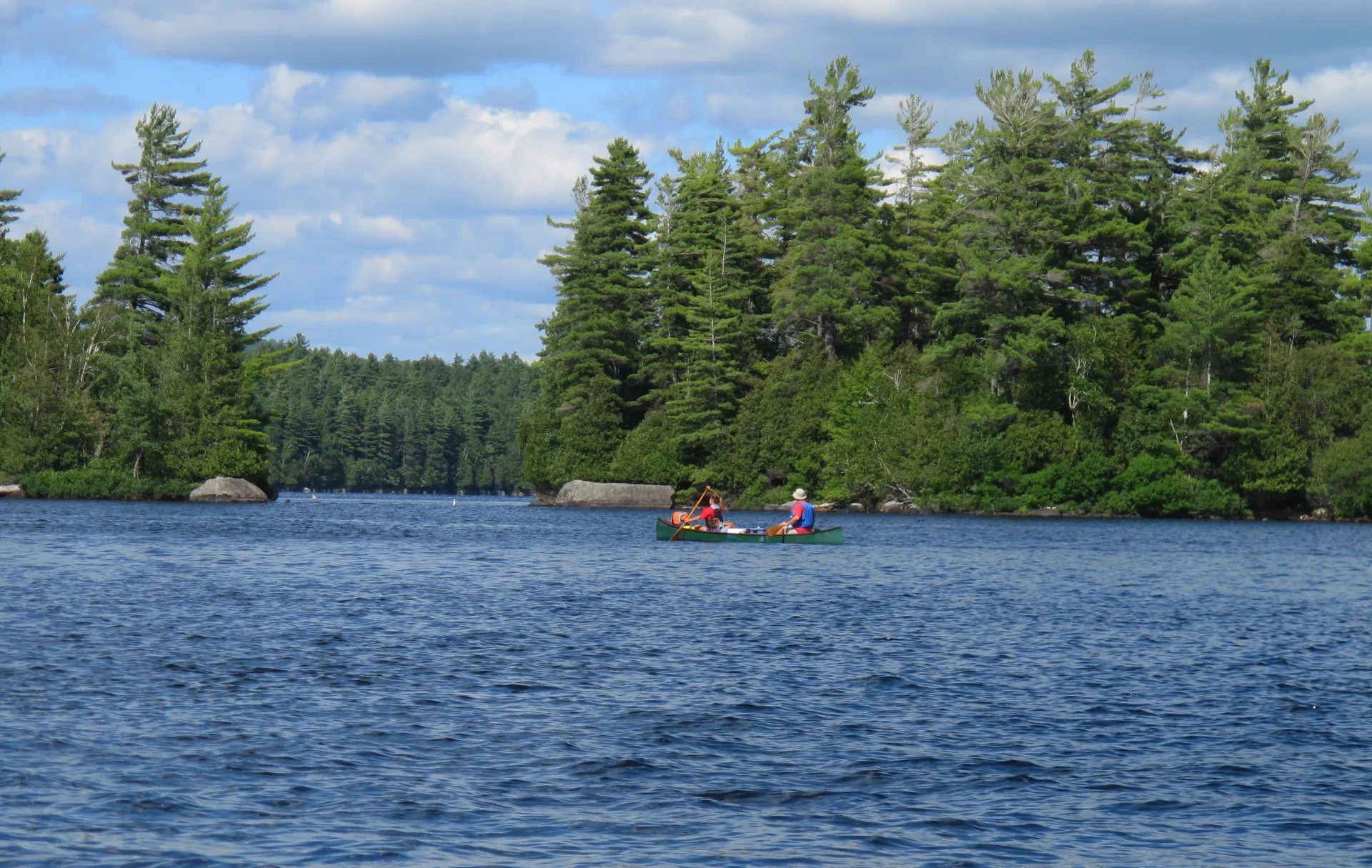 People paddling to their campsite on Lower Saranac Lake