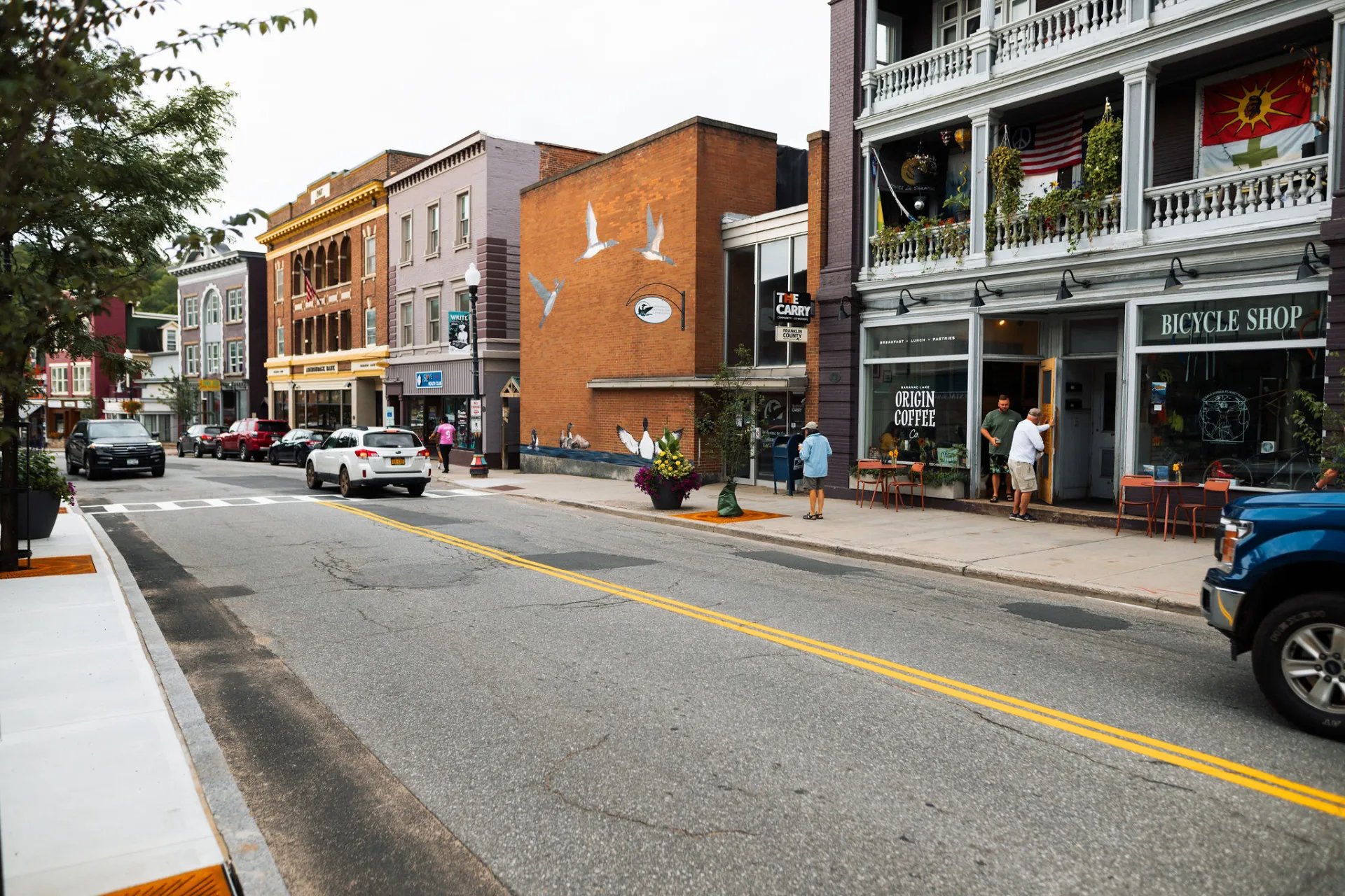 The exterior of Origin Coffee from the opposite side of Broadway in Saranac Lake.